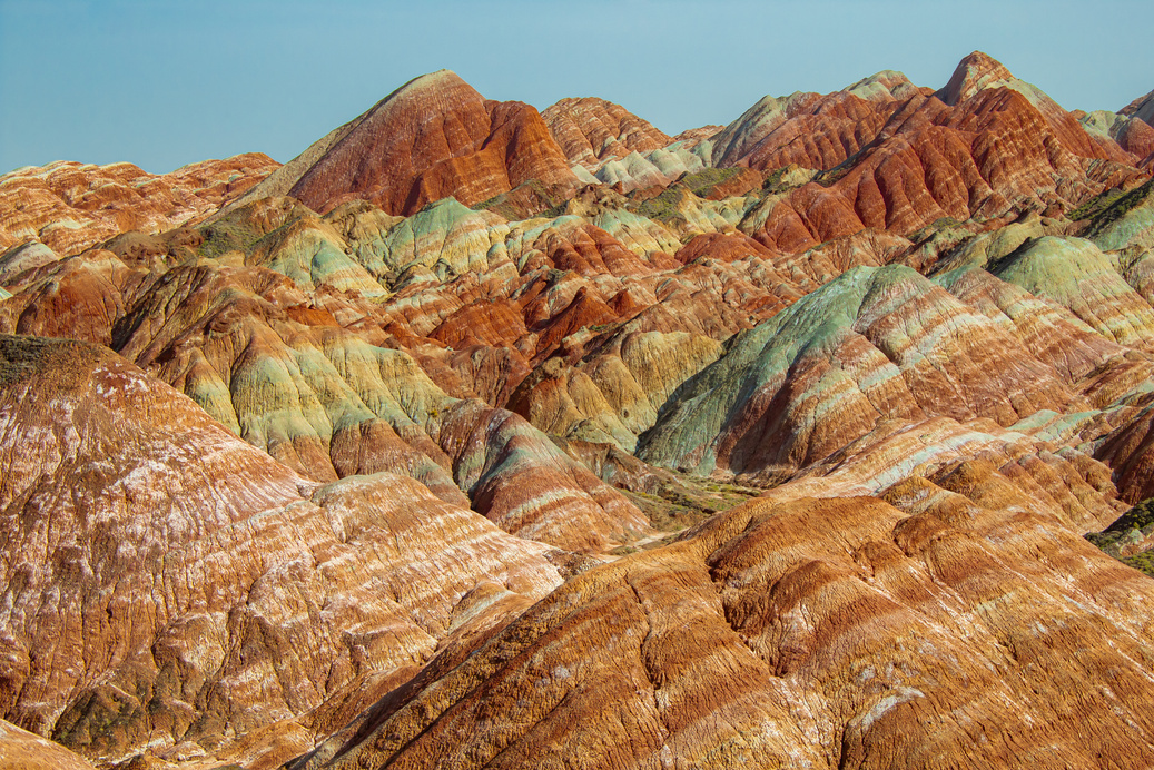 Danxia landform in Zhangye, China. Danxia landform is formed from red sandstones and conglomerates of largely Cretaceous age.