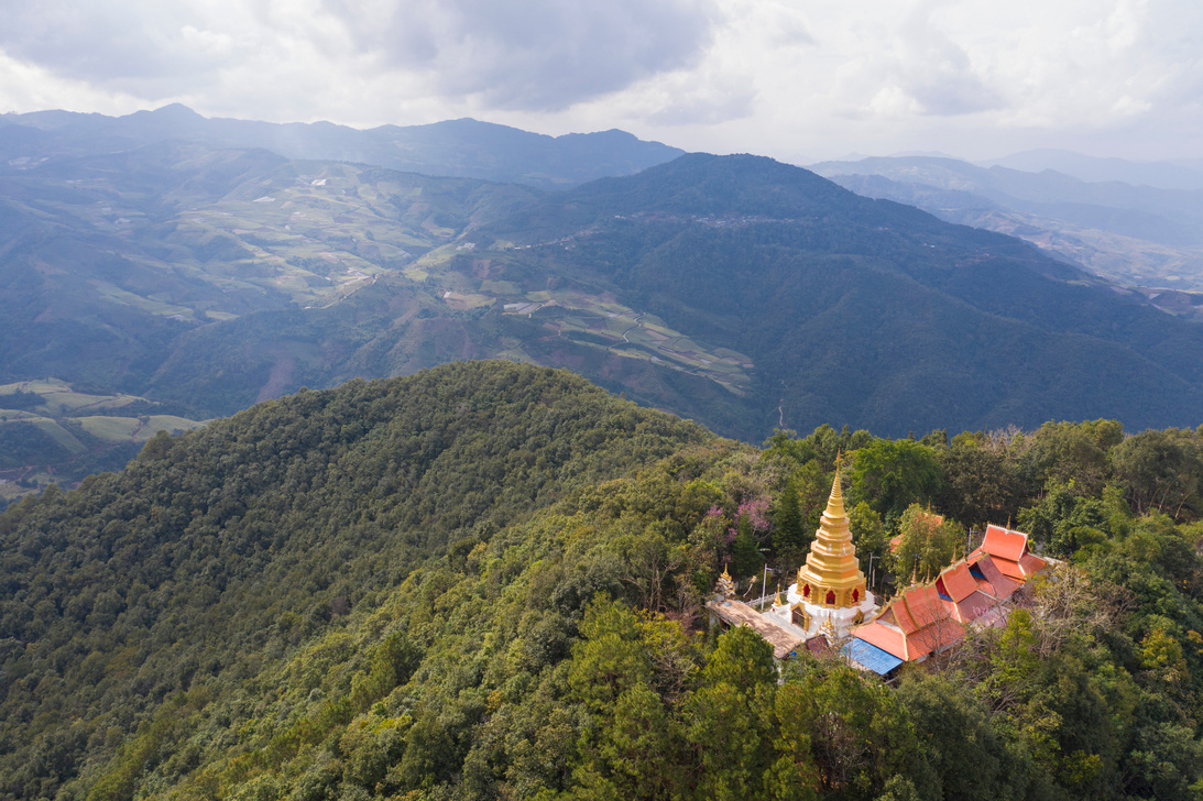 Aerial view of a remote Dai village in Xishuangbanna, Yunnan - China